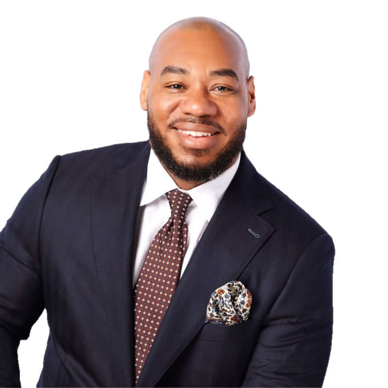 DeMarcus Strange in a navy suit
