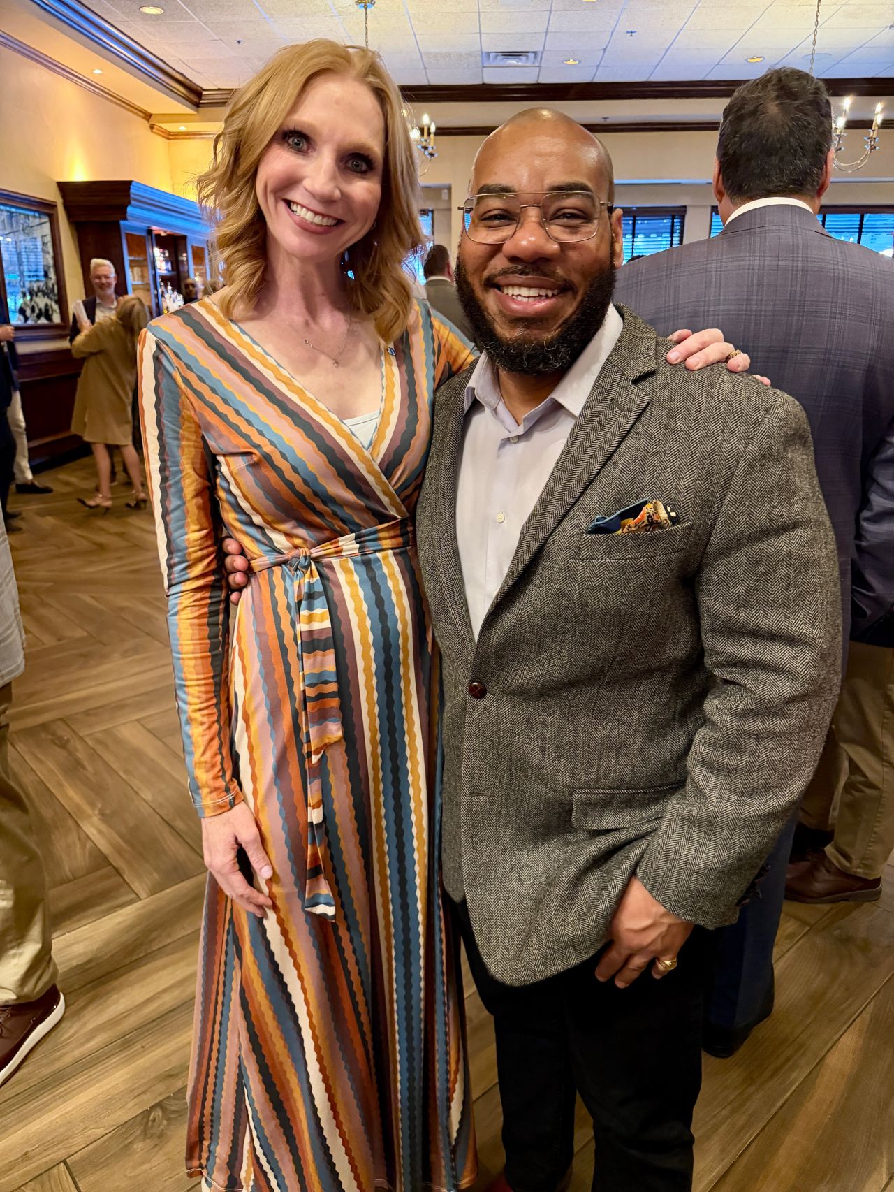 DeMarcus Strange with Carrie at a professional event