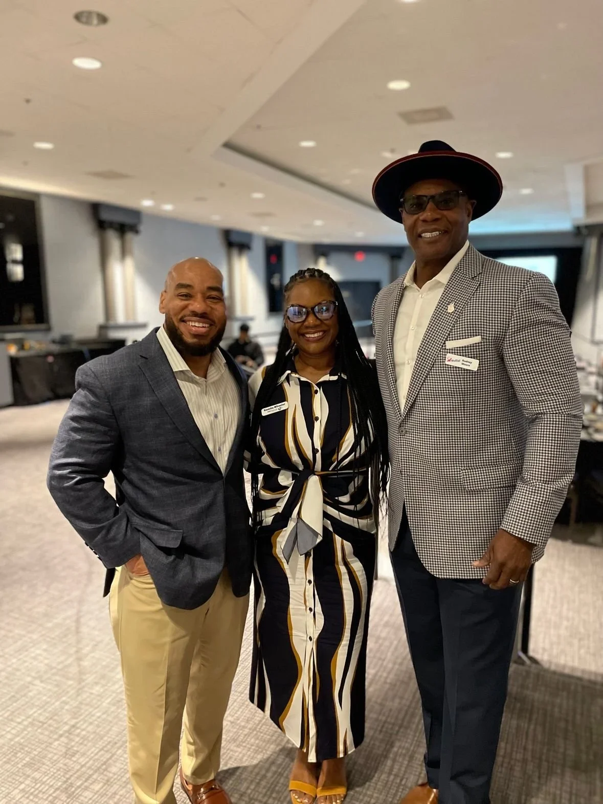 DeMarcus Strange with professional colleagues at a networking event
