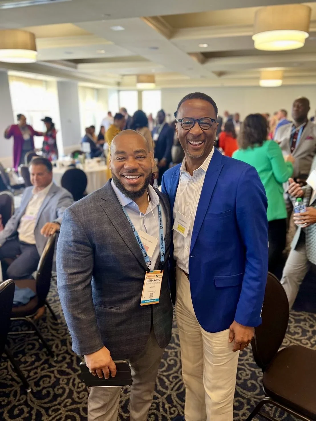 DeMarcus Strange connecting with a fellow professional at an industry event
