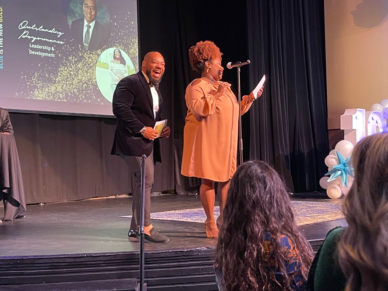 DeMarcus Strange on stage at a leadership event